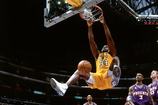 Shaquille O'neal aka Shaq dunking in a Lakers uniform sleep apnea