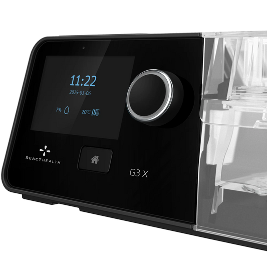 React Health G3X Auto CPAP machine with a black design digital display control dial home button and clear humidifier chamber beside it