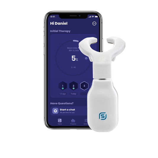 The eXciteOSA mouthpiece and next to cell phone with the eXciteOSA app open