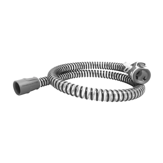 Gray coiled CPAP breathing tube with connector fittings displayed on a black background