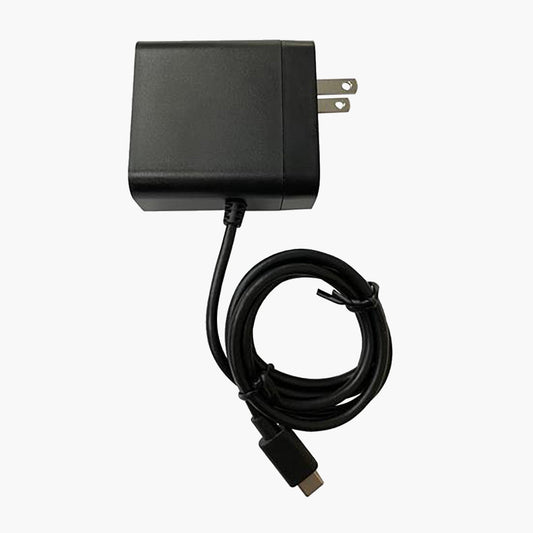 Lofta Explore CPAP Battery Smart Wall Charger on grey background.