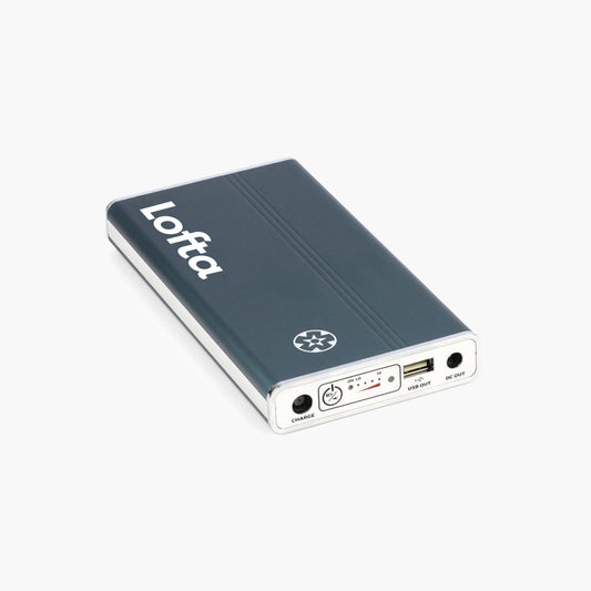 ResMed AirMini™ Battery - Medistrom Pilot-24 Lite on grey background.