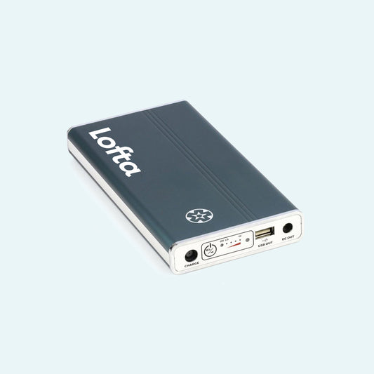 ResMed AirMini™ Battery - Medistrom Pilot-24 Lite on light blue background.