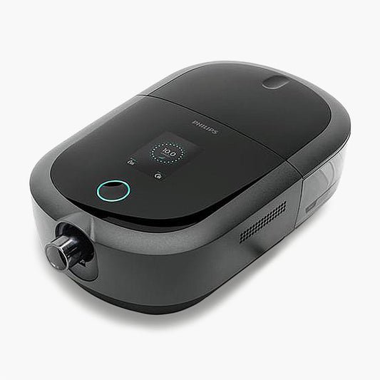 DreamStation 2 Auto CPAP Advanced with Humidifier on grey background.