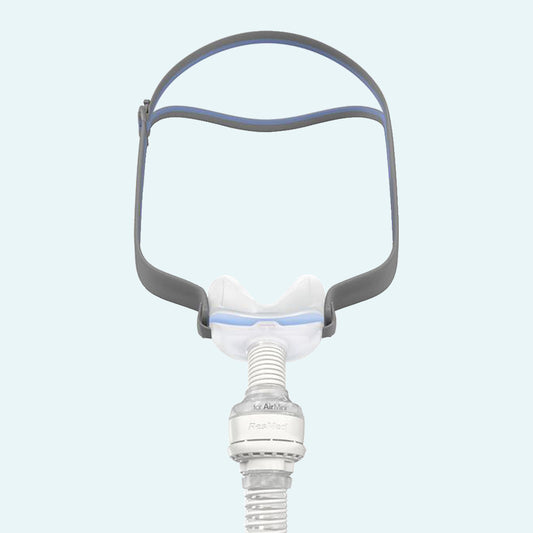 ResMed AirFit™ N30 Nasal CPAP Mask Complete System with AirMini™ Setup Pack on light blue background.