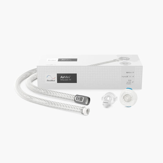 ResMed AirMini™ Travel CPAP Setup Pack for AirFit™ F20 Full Mask on grey background.