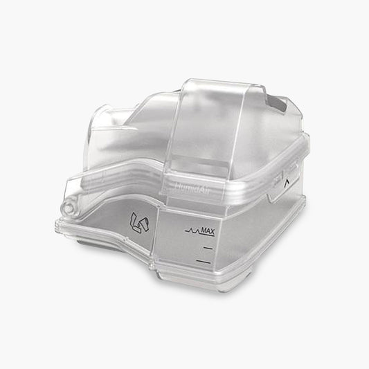 ResMed HumidAir™ Humidification Water Chamber for AirSense™ 10 and AirCurve™ 10 CPAP Machines on grey background.